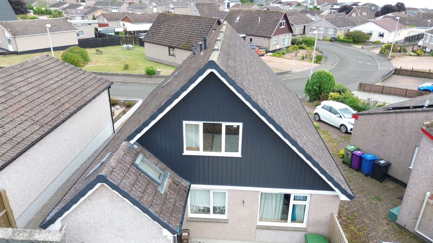 The same gable after EC2 fitted new cladding, fascias and guttering
